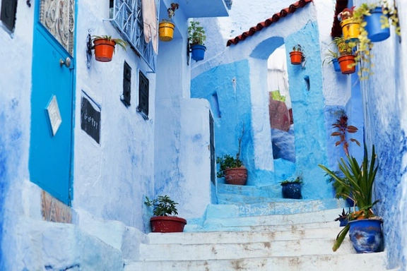 a blue street in Chefchaouen, best city in Morocco to visit