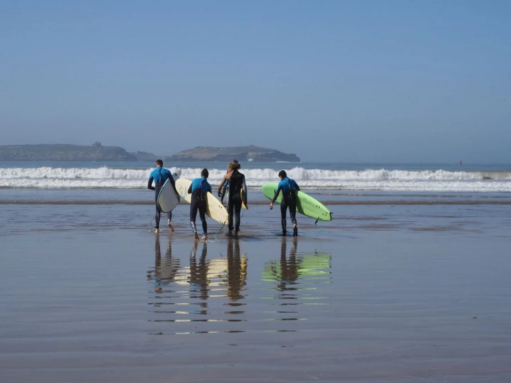 tourists surfing in Essaouira beach