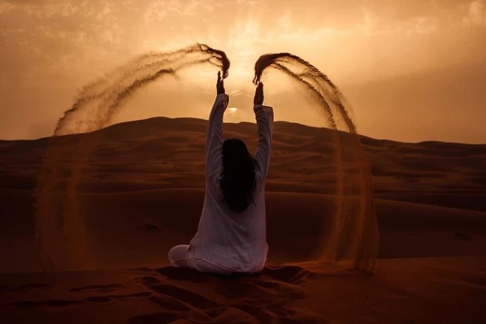 a woman in the Sahara desert of Morocco