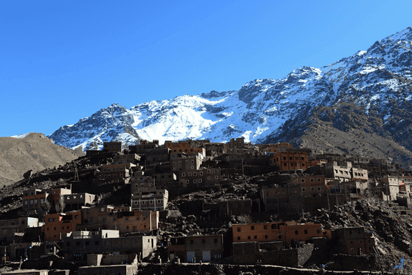 View of snow and old houses in Imlil mountains