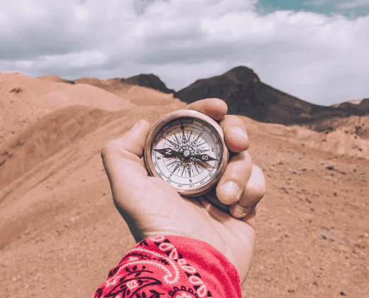 A woman hand with a compass in Morocco Trip.